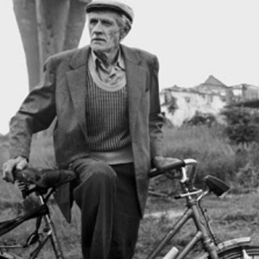 Photo of Fine Arts Professor Charles A. Meyer by his bike