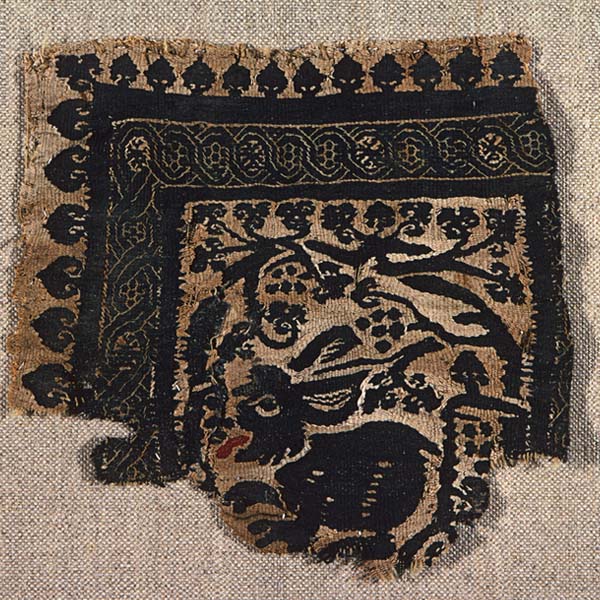 Textile fragment with hare and grapevine