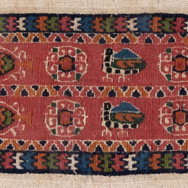 Textile band with stylized birds and foliage