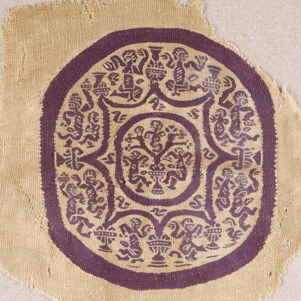Textile roundel with eight-pointed star, tree of life, dancing figures