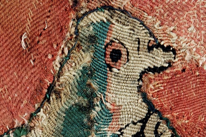 detail of embroidery showing dove