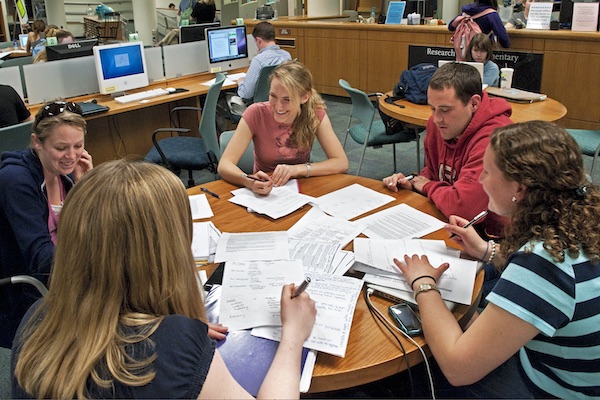 four students sitting around a table in the Educational Resource Center