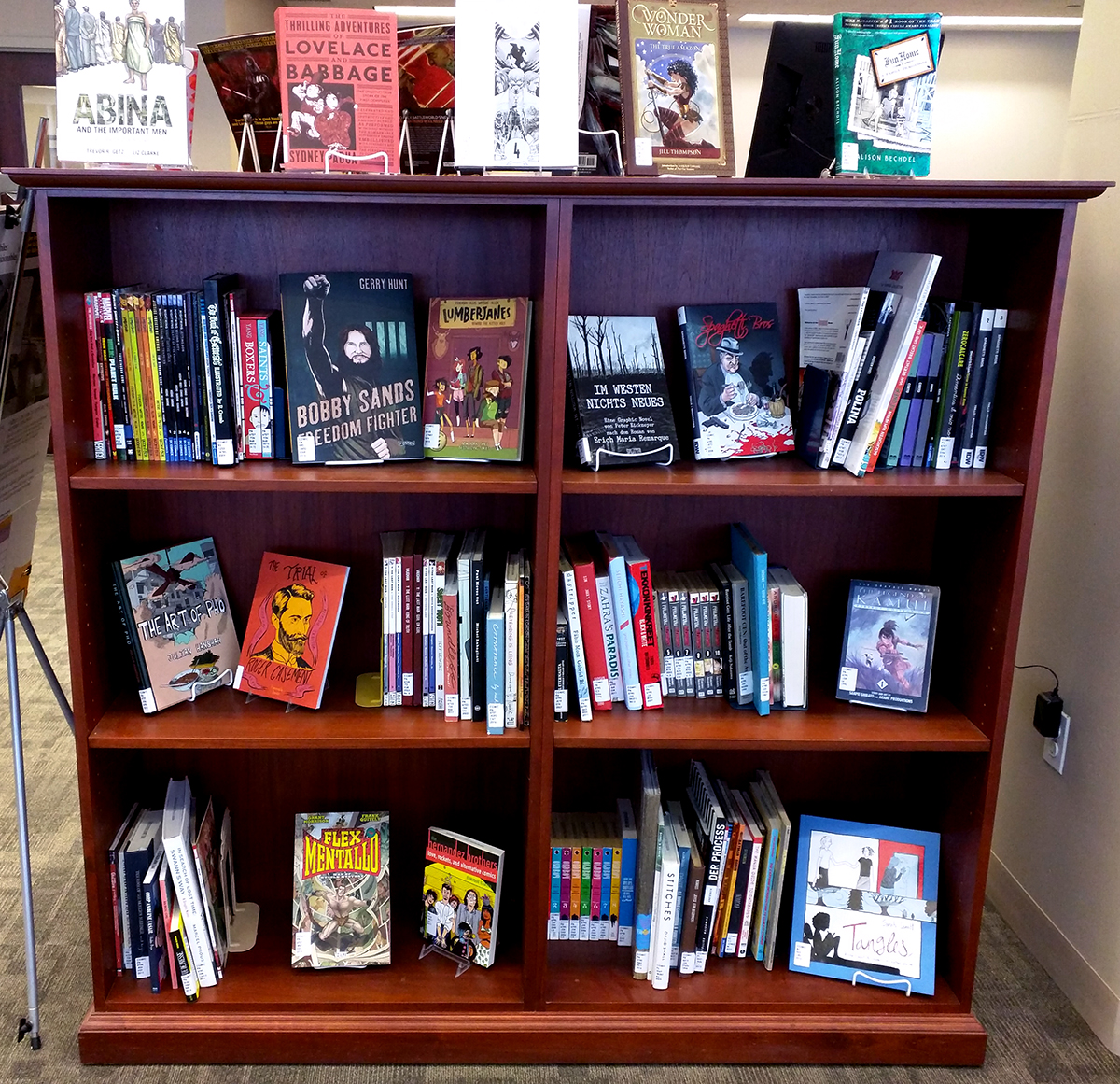 a bookshelf with comics