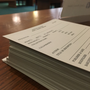 A stack of paper forms