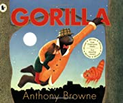 A chimpanzee in an orange jacket and plaid yellow hat swings from a branch holding a doll in the moonlight with a frightened orange cat in the background. Title: Gorilla