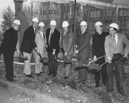  Dr. Campanella (fourth from left) at the groundbreaking event beginning the construction of O’Neill Library, Oct. 18, 1981.  Others present, left to right: Rev. Charles F. Donovan, SJ, Mr. Edward White, Mr. Robert White, (Dr.  Frank Campanella), Mr. Alfred Pennino, Dr. Thomas F. O'Connell, Rev.  J. Donald Monan, SJ, Mr. Royston Daley.